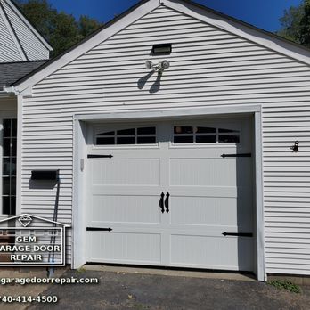 GEM Garage Door Repair - Love this long recessed ribbed panel with the 6 pane arch windows and the carriage hardware I just installed for a customer. Perfect Choice! - Garage Door Services Near Me GEM Garage Door Repair - Love this long recessed ribbed panel with the 6 pane arch windows and the carriage hardware I just installed for a customer. Perfect Choice! - Garage Door Services Near Me