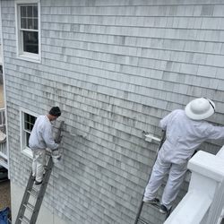 Aboff's Paints - My painters, the Carberry, Brothers, Scott and Rob, applying the Benjamin Moore stain to the cedar shake siding.