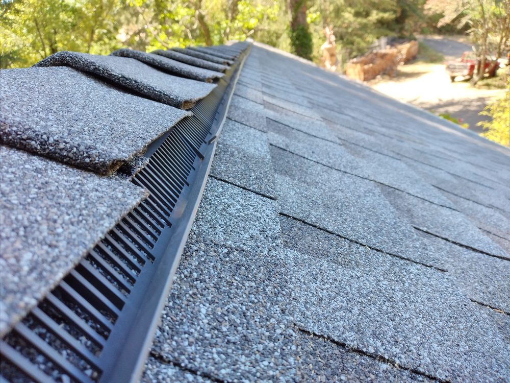 Slide of Trio Roofers