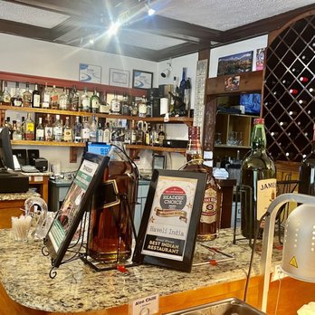 Haveli India - a bar counter with bottles of liquor - Indian Near Me - Middletown, Connecticut Haveli India - a bar counter with bottles of liquor - Indian Near Me - Middletown, Connecticut