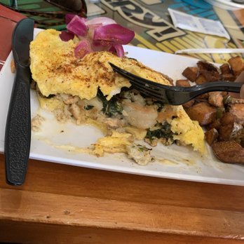 Rhythm and Brunch - Inside of the seafood omelette. Nicely seasoned, creamy seafood. Nice portion, not skimpy - New American Near Me - Philadelphia, Pennsylvania Rhythm and Brunch - Inside of the seafood omelette. Nicely seasoned, creamy seafood. Nice portion, not skimpy - New American Near Me - Philadelphia, Pennsylvania