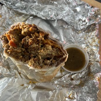 Ariel's Breakfast  - Chorizo breakfast burrito with some bomb spicy salsa on the side - Breakfast & Brunch Near Me - San Francisco, California