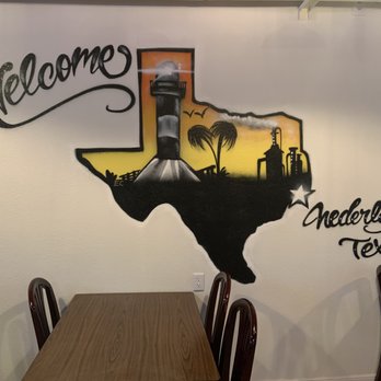 Twin City Seafood - a table and chairs in a restaurant - Seafood Near Me - Nederland, Texas Twin City Seafood - a table and chairs in a restaurant - Seafood Near Me - Nederland, Texas