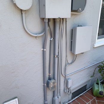 Jess Electric - New conduit on the far left. Neat, tidy work. - Electricians Near Me Jess Electric - New conduit on the far left. Neat, tidy work. - Electricians Near Me