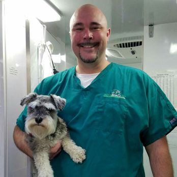 Nova Mobile Vet - Dr. Cryan inside his state of the art mobile hospital that offers digital x-rays, dentistry and surgery. - Veterinarians Near Me - Lorton, Virginia