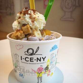I CE NY - I ordered this beautiful mix in a cup: With Taro Ice cream mixed with lychee, topped with Cheesecake bites, peaches and whip cream! - Desserts Near Me - New York, New York