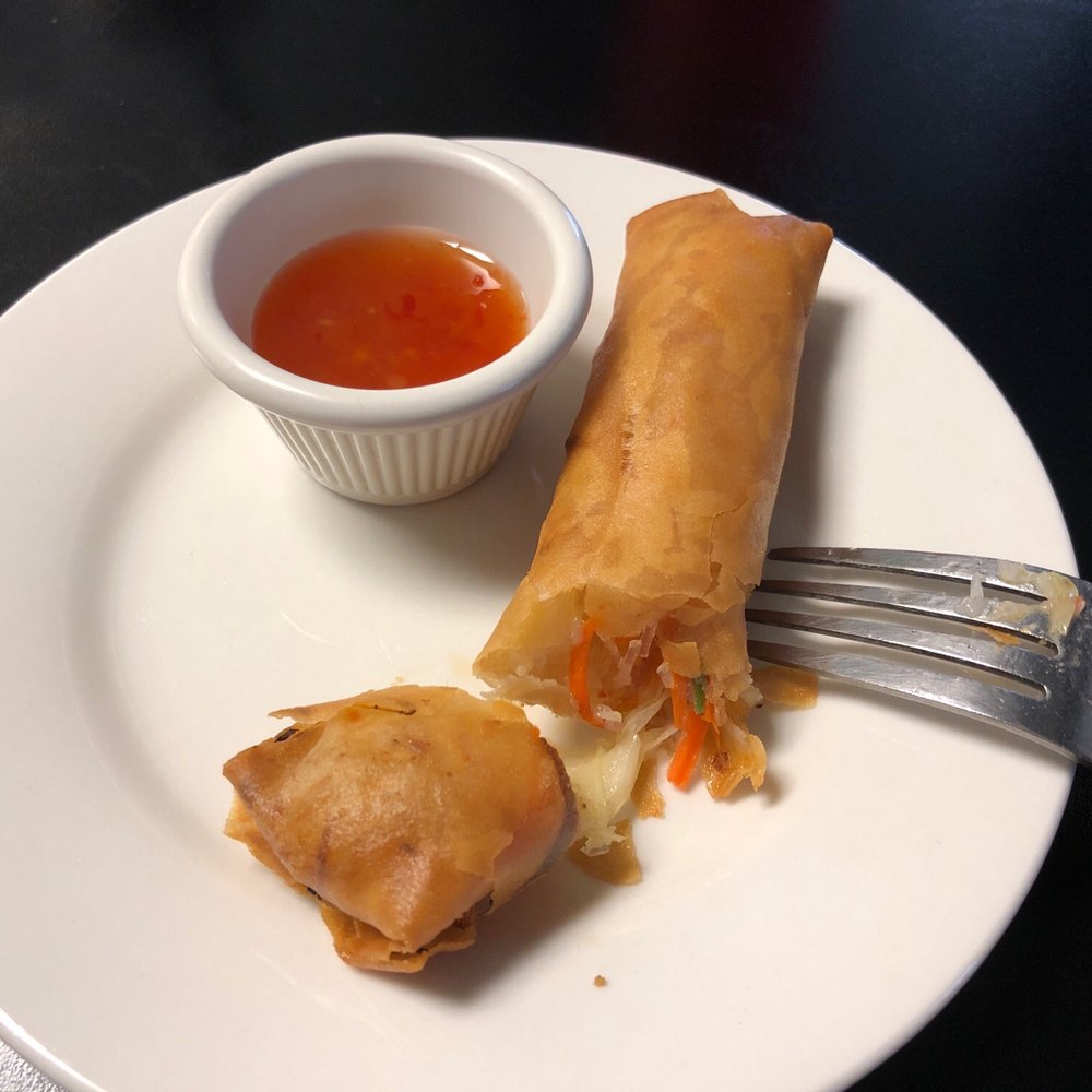 Bangkok Chef - a plate of food and a fork - Thai Near Me - Caledonia, Michigan