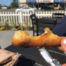Pictured Rocks Pizza - The crust shot in the sun? This is what I love, a perfect oily crunchy doughy hot crust
