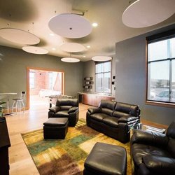 Elite Event Venue - The Game Room is set up like a living room with TV's and wet-bar.