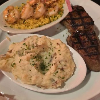 Manny's Original Chophouse - Steak and grilled shrimp dinner - Steakhouses Near Me - Haines City, Florida Manny's Original Chophouse - Steak and grilled shrimp dinner - Steakhouses Near Me - Haines City, Florida