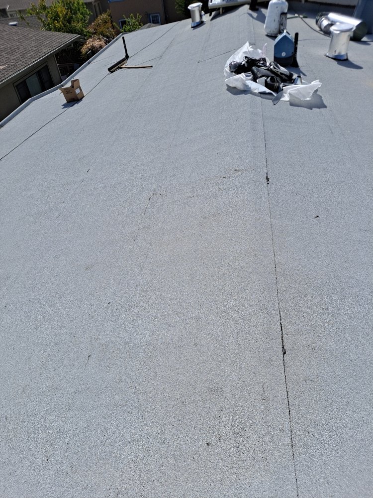 Slide of Mendoza & M  Roofing