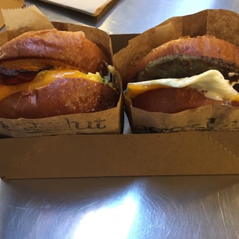 Eggslut - Left: Fairfax with bacon. Right: sausage, egg, and cheese - Breakfast & Brunch Near Me - Los Angeles, California Eggslut - Left: Fairfax with bacon. Right: sausage, egg, and cheese - Breakfast & Brunch Near Me - Los Angeles, California