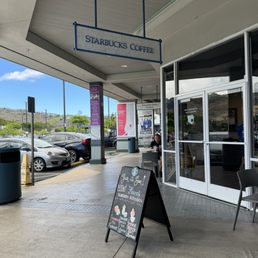 the entrance of a coffee shop