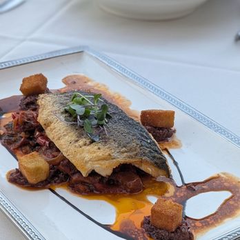 Normandie - Mediterranean sea bass with peppers and eggplant - French Near Me - Napa, California Normandie - Mediterranean sea bass with peppers and eggplant - French Near Me - Napa, California