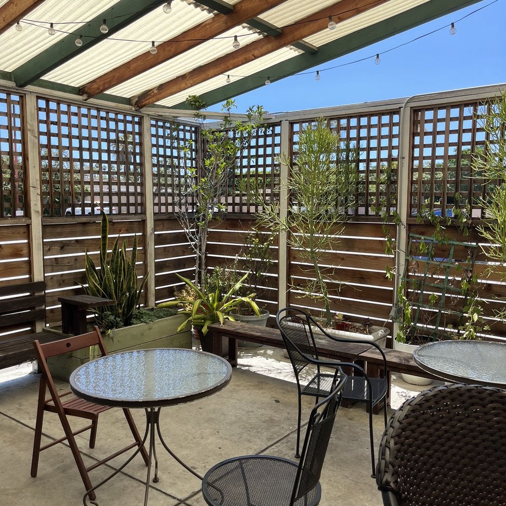 Yonder Coffee - Outside patio is covered & enclosed. Plenty of tables - Coffee & Tea Near Me - Northridge, California Yonder Coffee - Outside patio is covered & enclosed. Plenty of tables - Coffee & Tea Near Me - Northridge, California