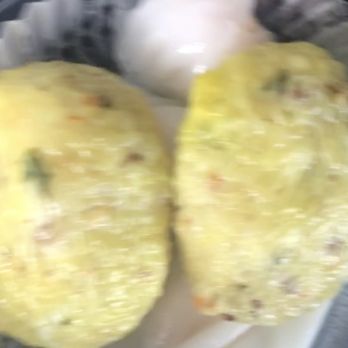 Dim Sum King - Sorry the photo is blurry it was a video, but this rice balls are sooooooooooo good - Dim Sum Near Me - Seattle, Washington