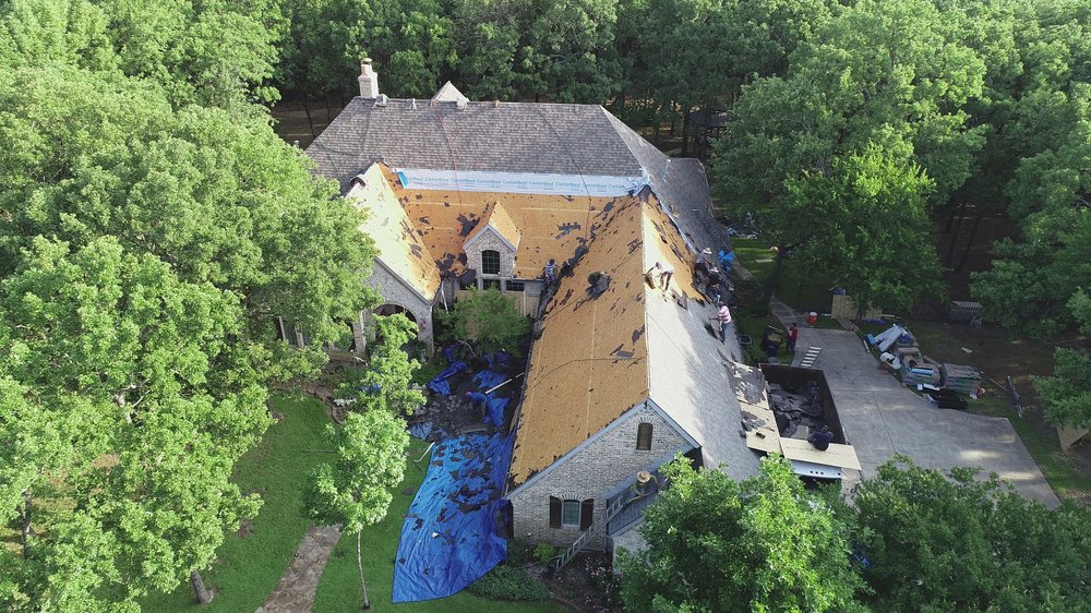 Slide of Mac's Roofing Construction & Restoration