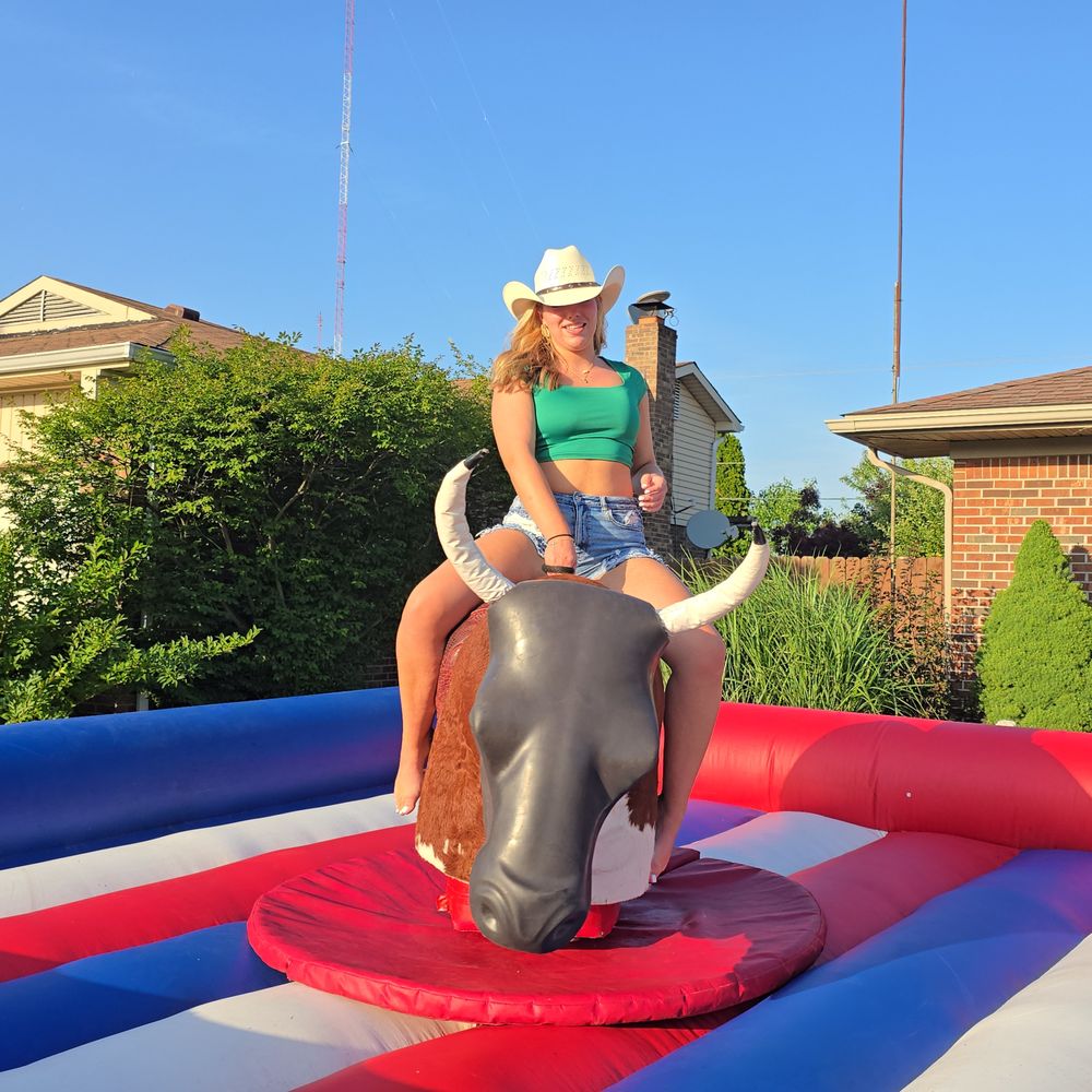 Jump and Jam Rentals - Girl rides bull - Party Equipment Rentals Near Me Jump and Jam Rentals - Girl rides bull - Party Equipment Rentals Near Me