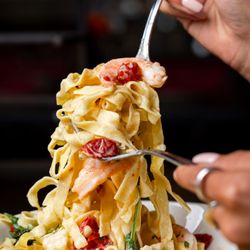 Pizzalina - (Land & Sea)
house-made egg fettucini, pork guanciale, gulf white shrimp, pork n'duja-saffron broth, wild arugula, pan grattato