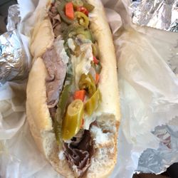 Press Break - Italian Beef Combo with hot and sweet peppers, provolone cheese.