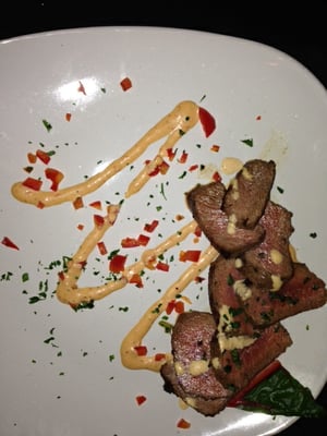 Photo of SIP Appetizer Bar - Oak Lawn, IL, US. Marinated Steak. Need smaller plate or add an element, please.  I prefer the latter.  Good flavor and tender.