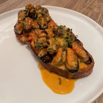 Apolonia - Mussels toast - Modern European Near Me - Chicago, Illinois Apolonia - Mussels toast - Modern European Near Me - Chicago, Illinois