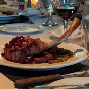 Grotto - pork tomahawk with fingerling potatoes - Italian Near Me - Syracuse, New York
