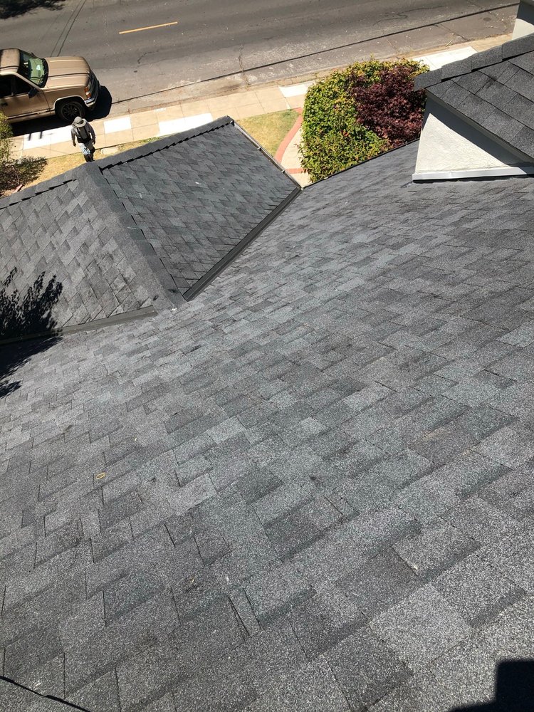 Slide of McGraw and Sons Roofing