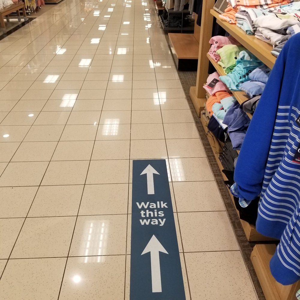 Directional arrows in main aisles