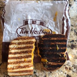 Tim Hortons - My daughter ordered the grilled cheese and it was burnt and the smell was awful.