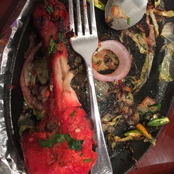 Deccan Spice - Mutant huge leg piece. Kept a large sized fork near it for scale. (We had eaten portions of this leg already still it has so much meat). - Indian Near Me - Jersey City, New Jersey Deccan Spice - Mutant huge leg piece. Kept a large sized fork near it for scale. (We had eaten portions of this leg already still it has so much meat). - Indian Near Me - Jersey City, New Jersey