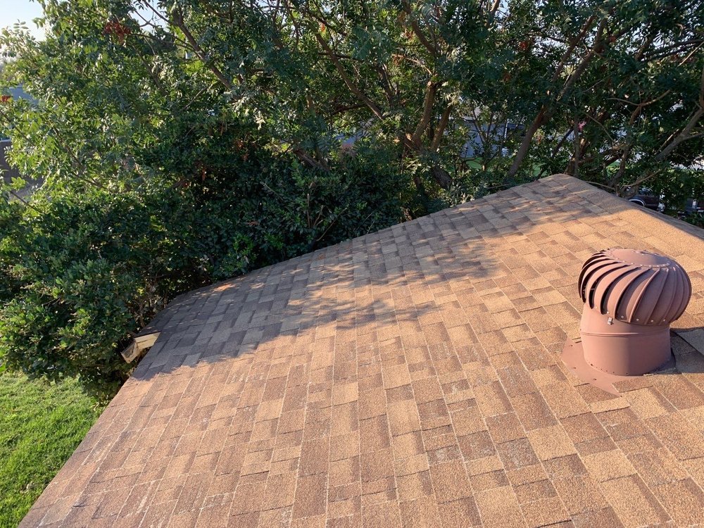 Slide of Rainy Day Roofing