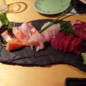 Yumei Sushi - Sashimi on slate - salmon belly, white fish, red tuna, yellowfish - Sushi Bars Near Me - Toronto, Ontario Yumei Sushi - Sashimi on slate - salmon belly, white fish, red tuna, yellowfish - Sushi Bars Near Me - Toronto, Ontario