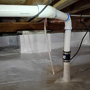 We Crawl Space Foundation Repair - French Drain installed to sump pump with drain line to expel any collected water - Foundation Repair Near Me - Chesapeake, Virginia We Crawl Space Foundation Repair - French Drain installed to sump pump with drain line to expel any collected water - Foundation Repair Near Me - Chesapeake, Virginia