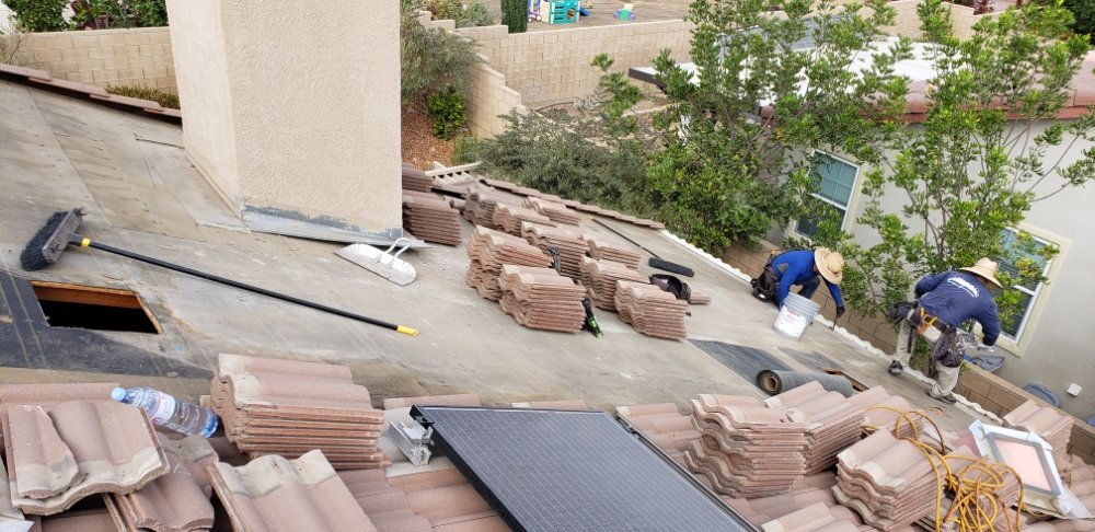 Slide of Lopez Roofing