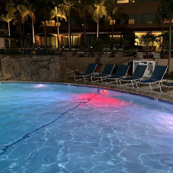 DoubleTree by Hilton San Juan - Pool lounge chairs - Hotels Near Me - San Juan, Puerto Rico