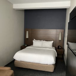 Smallish bedroom area but it extends to a sitting area and kitchen. Smallish bedroom area but it extends to a sitting area and kitchen.