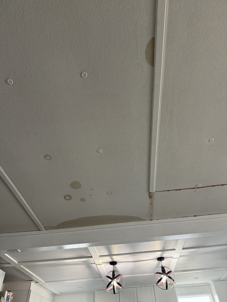 Slide of All Weather Roofing