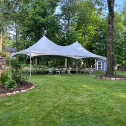 Dam Event and Equipment Rental - 20x40 event tent with tables and chairs.
