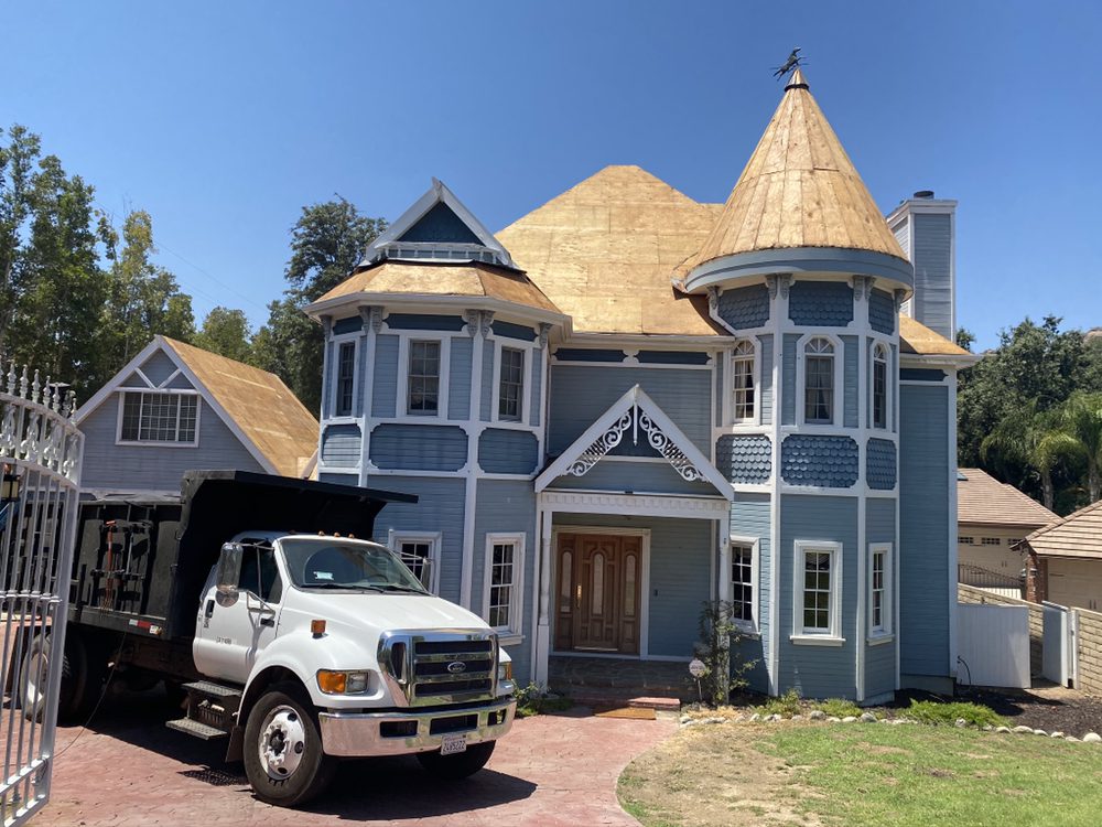 Slide of Imperial Roofing