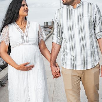 Fintography - Playing around with some color as we build excitement for their expected baby boy! This maternity photo was a blast! - Real Estate Photography Near Me
