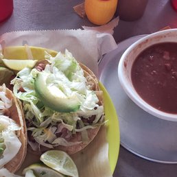 Veggie tacos with a side of beans sans cheese and sour cream.