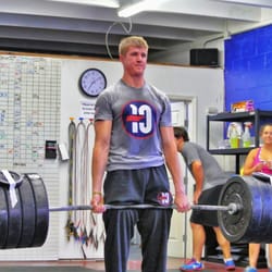 CrossFit Forte - We had to get more compact 45# plates so Kurt could find out his true deadlift max! Jamie, in the background, is amazed.