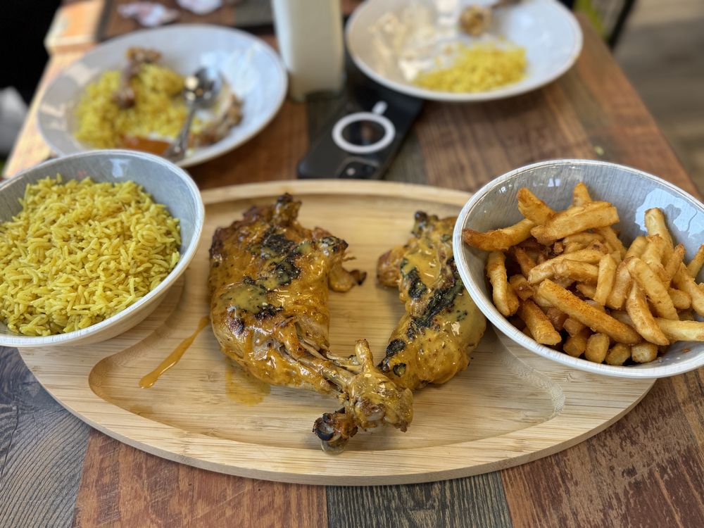 Tribos Peri Peri Logo