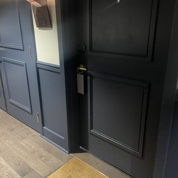 Halcyon, a hotel in Cherry Creek - Welcome mat and info pocket at each door. Classy touches. Sad the mats were wearing off. - Hotels Near Me - Denver, Colorado