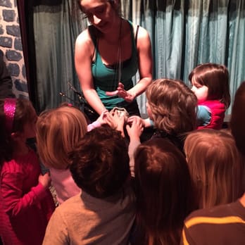 Puppetworks - Puppeteer letting the children see and touch a marionette. Lovely - Performing Arts Near Me - Park Slope, New York