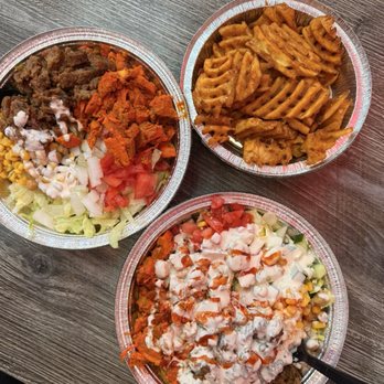 Gyro Hut - Rice Platter Combo- lamb & chicken- one with sauce on, with with sauce on the side - Halal Near Me - Houston, Texas Gyro Hut - Rice Platter Combo- lamb & chicken- one with sauce on, with with sauce on the side - Halal Near Me - Houston, Texas