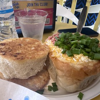 Splash Cafe - Clam chowder bread bowl w/ cheese, bacon and green onions - American Near Me - Pismo Beach, California