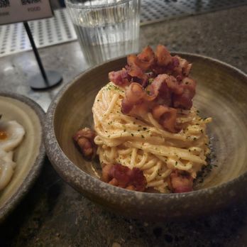 Sozai - Mentaiko Pasta- Spaghetti, creamy spicy cod roe, topped with bacon and seaweed. $17. Decent - Izakaya Near Me - New York, New York