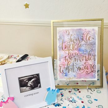 Menakshee Designs - Custom watercolor signage for a gender reveal - Calligraphy Near Me Menakshee Designs - Custom watercolor signage for a gender reveal - Calligraphy Near Me